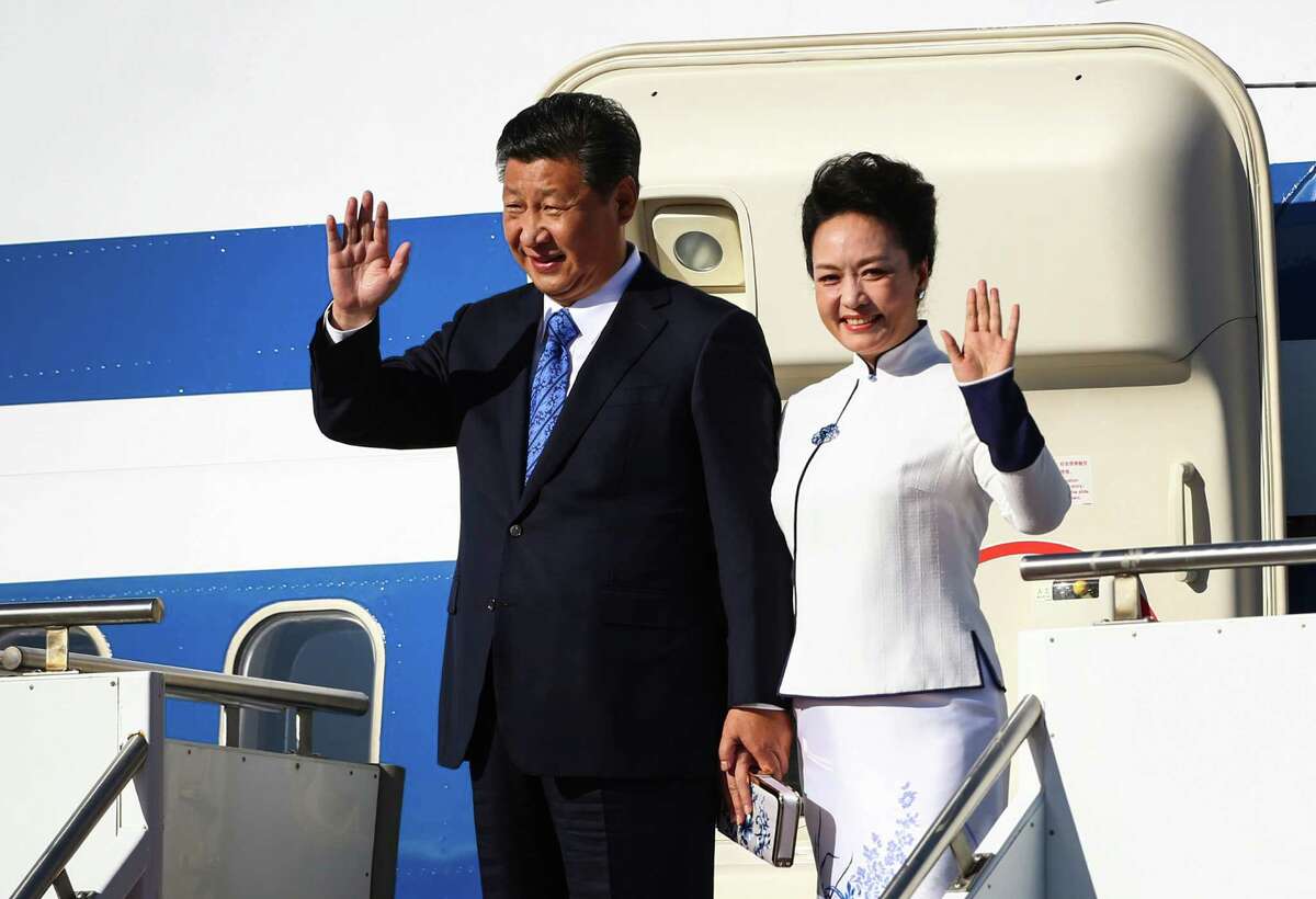 Chinese President Xi Jinping and his wife Peng Liyuan arrive in the Seattle area as they depart an Air China, Boeing 747. The Chinese leader will be in the Seattle area visiting with government and business leaders. Photographed at Paine Field on Tuesday, September 22, 2015.