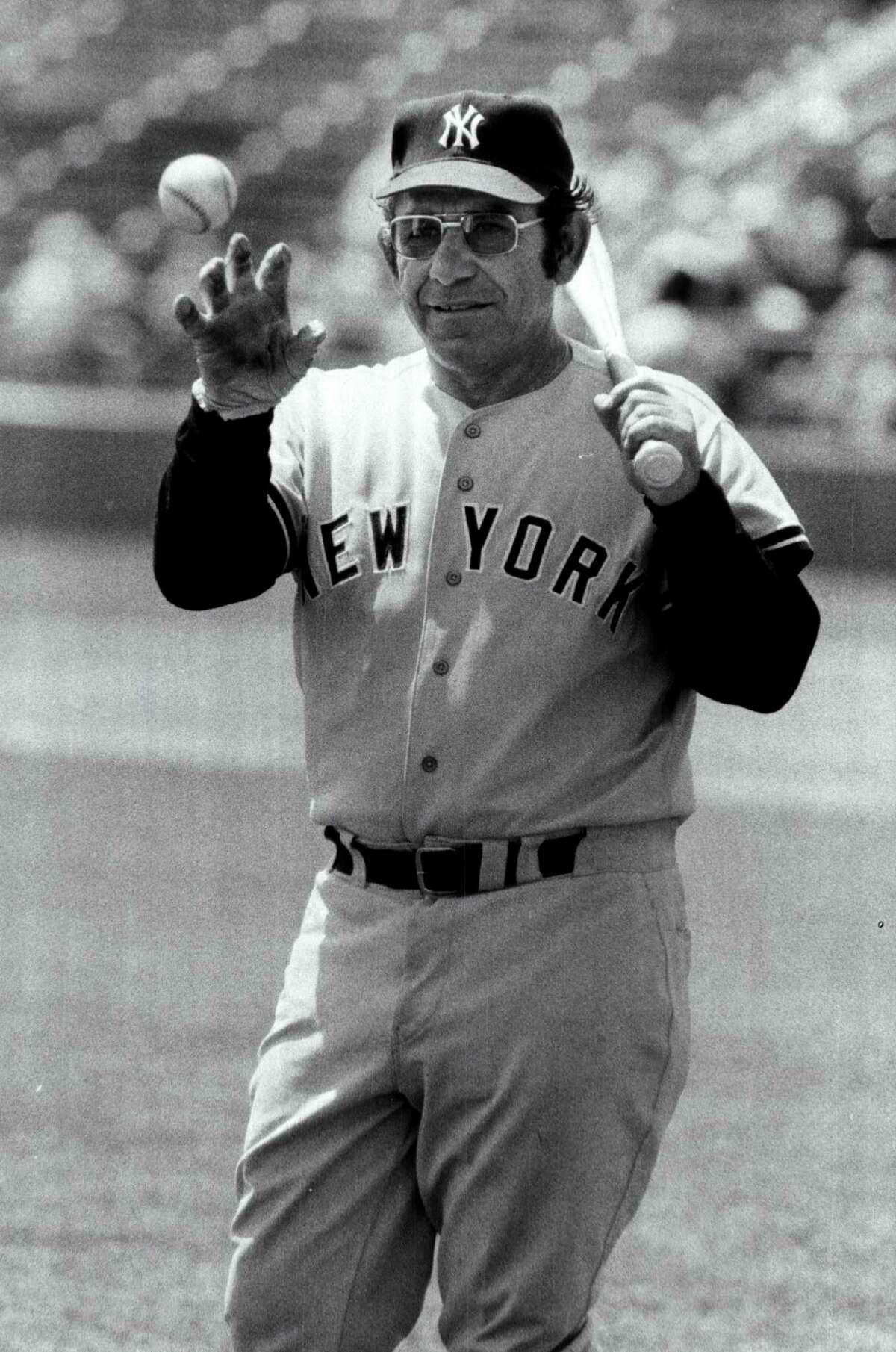 Yankees Hall of Fame catcher Yogi Berra dies at 90