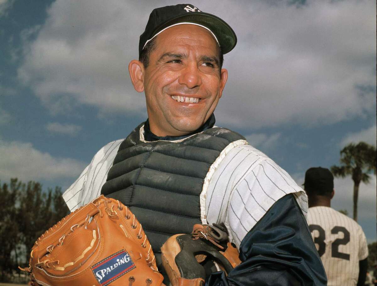 New York Yankee catcher Yogi Berra poses at spring training in Florida, in an undated file photo. Berra, the Yankees Hall of Fame catcher has died. He was 90.