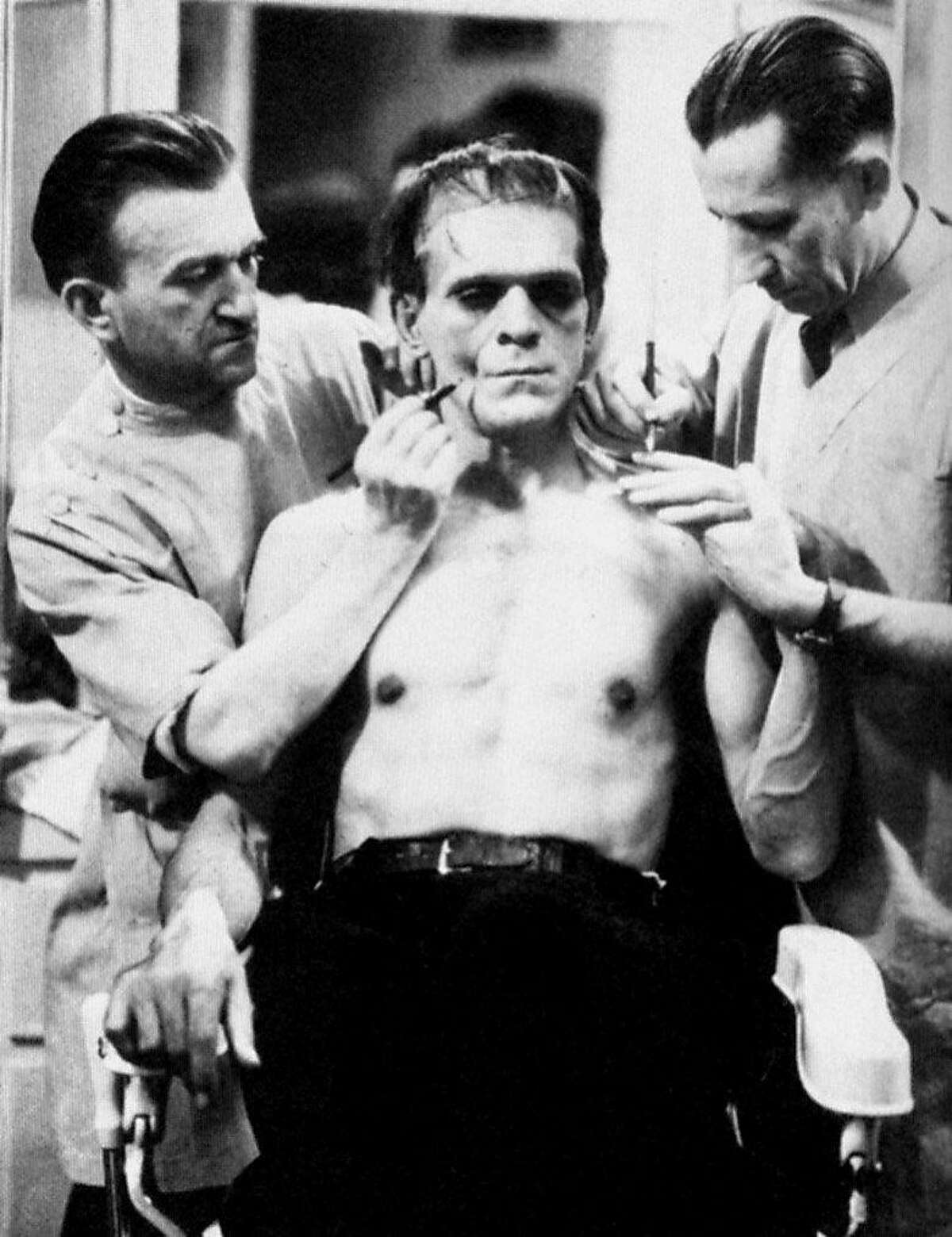Hi, for karloff28 in Pink 5/28, need the following picture of Boris Karloff, center, being made up as Frankenstein's monster by makeup man Jack Pierce, left (guy at right is not identified).Ê Please slug it Karloff28_frankenstein. Ran on: 05-28-2006 The Balboa series will include footage of Boris Karloff, center, being made up as Franken- stein's monster by Jack Pierce, left.