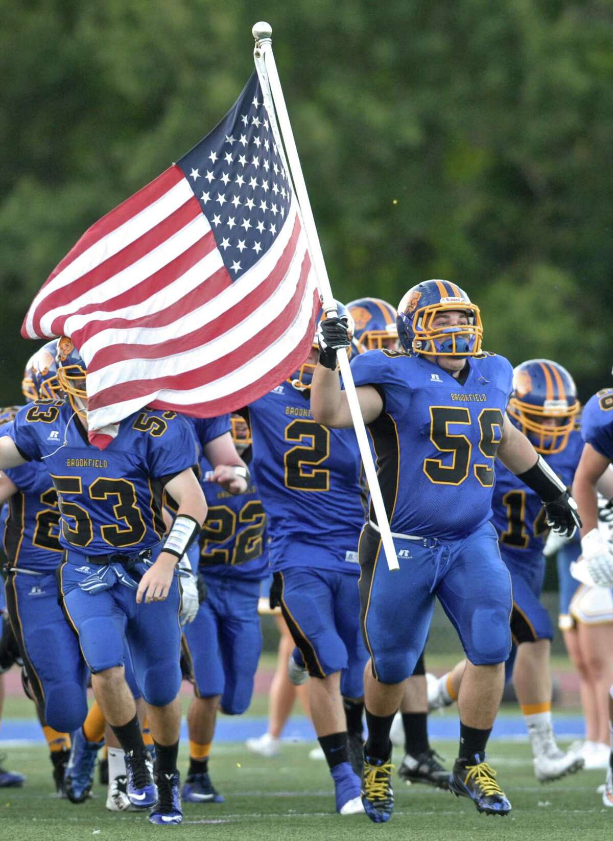 Photographs from football game between New Fairfield and Brookfield high schools on Friday night, September 11, 2015, at Brookfield High School, Brookfield, Conn.