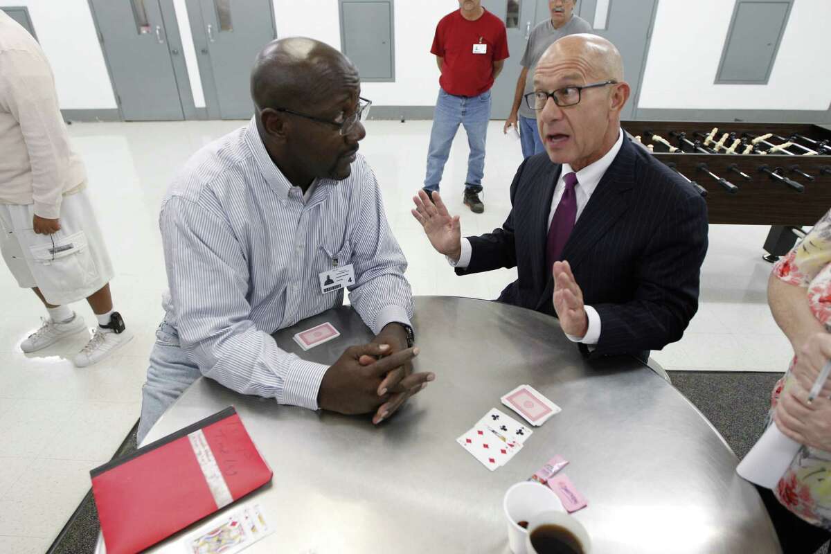 Senator John Whitmire talks with Ronald Mitchell in the Bill Clayton Center Wednesday, Sept. 23, 2015, in Littlefield. The state's new home for sex predators, Billy Clayton Center, located in an isolated fly speck of a town in West Texas, looks more like a prison than a treatment center. There are complaints about too-tiny portions of food, lack of treatment programs and commissary, and the nowhere location - some which officials are working to correct, others which they cannot. Fact: After a two-year search, this was the only place the state could find to house them. ( Steve Gonzales / Houston Chronicle )