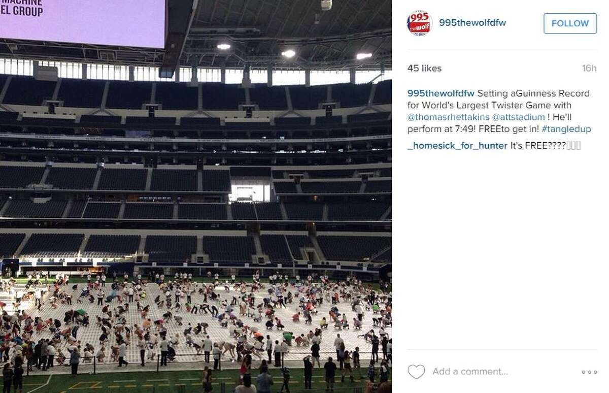 "Setting a Guinness Record for World's Largest Twister Game with @thomasrhettakins @attstadium ! He'll perform at 7:49! FREE to get in! #tangledup," @995thewolfdfw