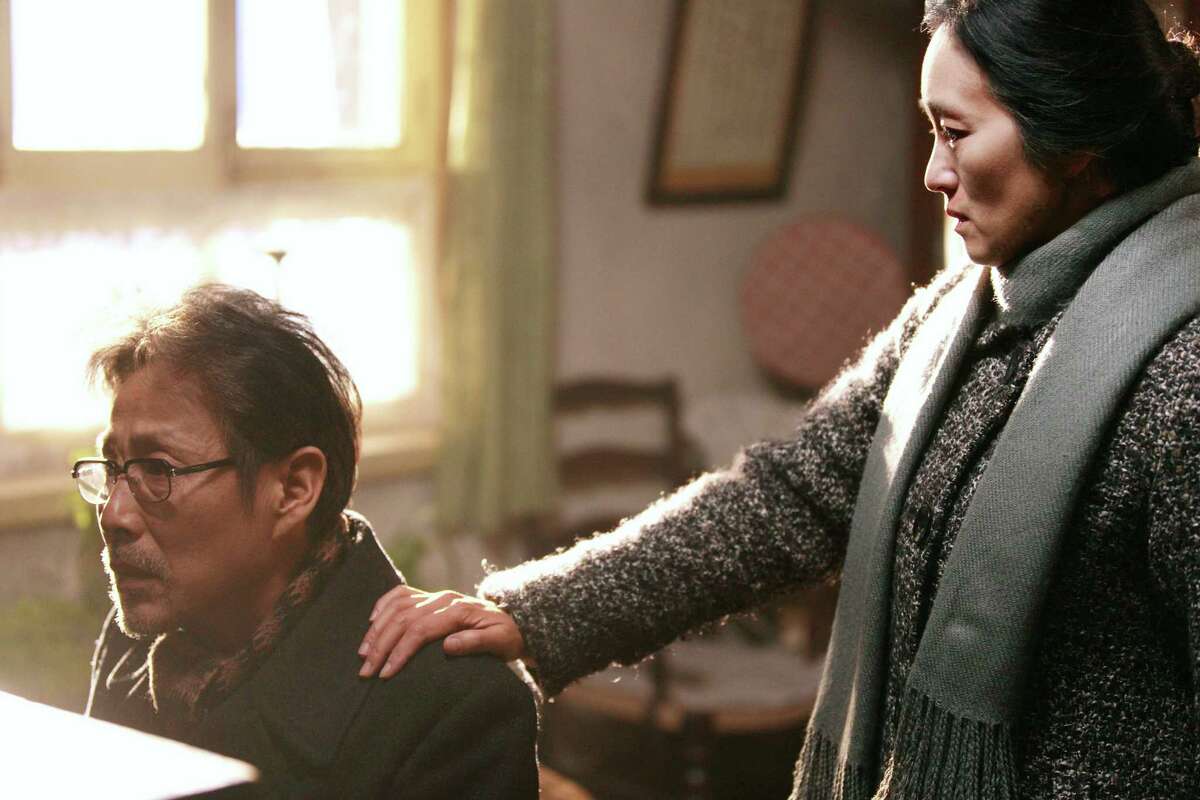 Left to right: Lu Yanshi (Chen Daoming, left) and Feng Wanyu (Gong Li) are a husband and wife in post-Cultural Revolutionary China in Zhang Yimou's "Coming Home."