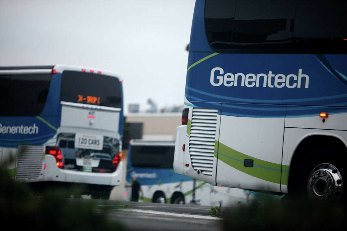 The Genetech parking lot in South San Francisco. Shuttle drivers who transport Genentech employees received a wage increase Thursday, from $17-20 an hour, to $24 an hour.