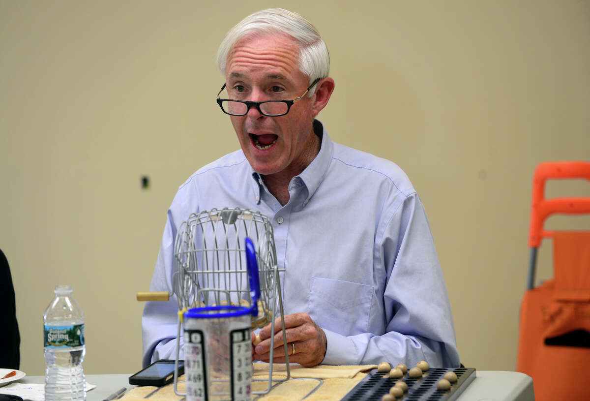 Mayor Bill Finch calls out bingo numbers during a game at the Twin Towers Housing Complex in Bridgeport, on Thursday. Hours before, residents of that complex endorsed him as a third party mayoral candidate on the new Job Creation line.