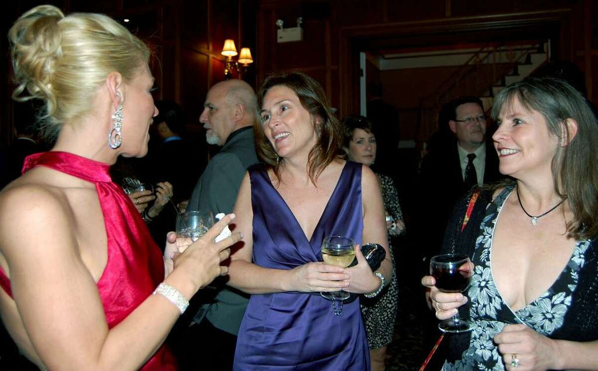 SPECTRUM/Among those on hand for the March 13, 2010 New Milford High School Booster Club gala at the Fox Hill Inn in Brookfield were, from left to right, Renee Grossenbacher, Board of Education chairman Wendy Faulenbach and Sandi Berry. The event was held to raise funds to build an expanded rest facility at the Joseph Wiser Athletic Complex at New Milford High School.