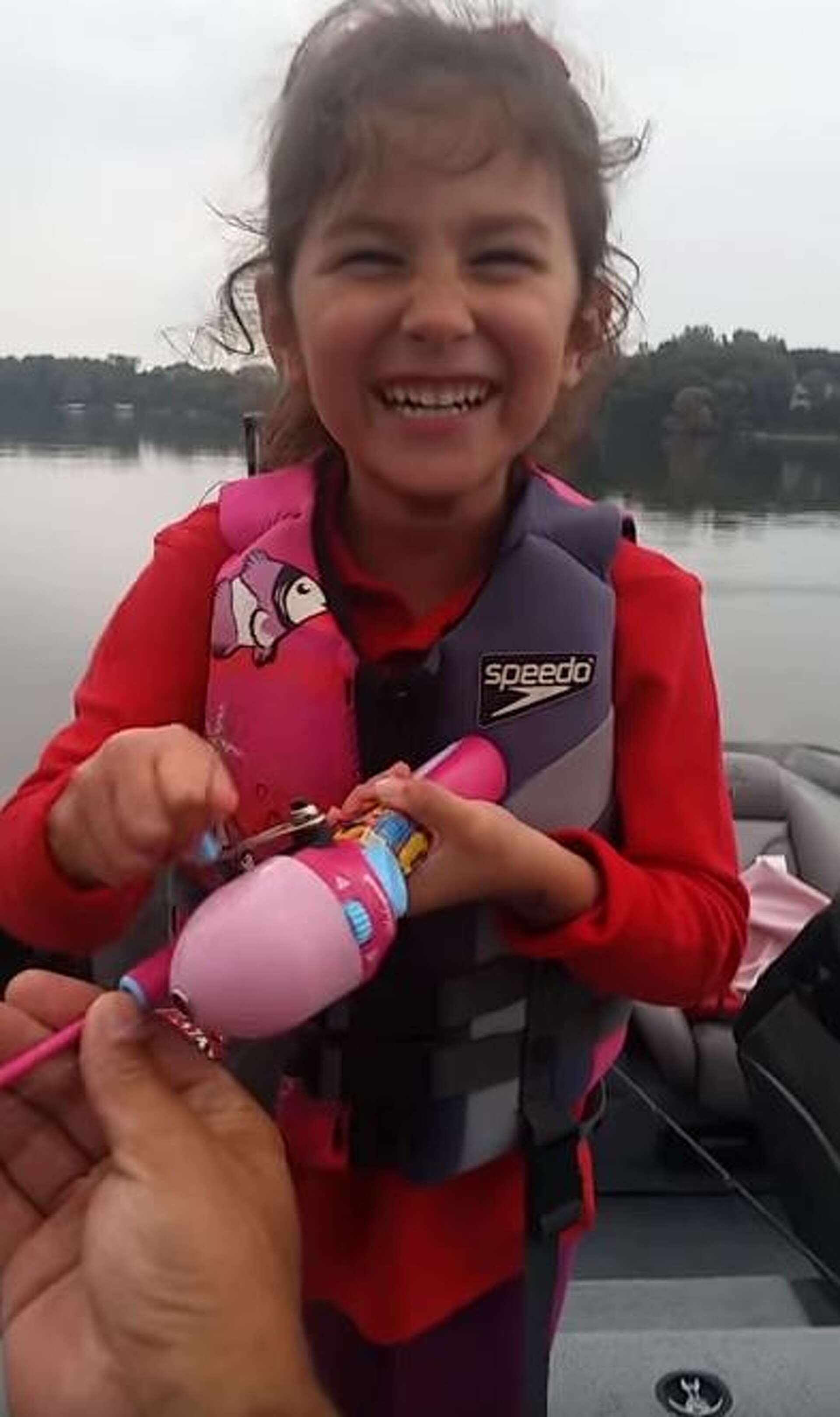 barbie fishing pole record This little girl just owned a 20-inch bass with a Barbie fishing pole