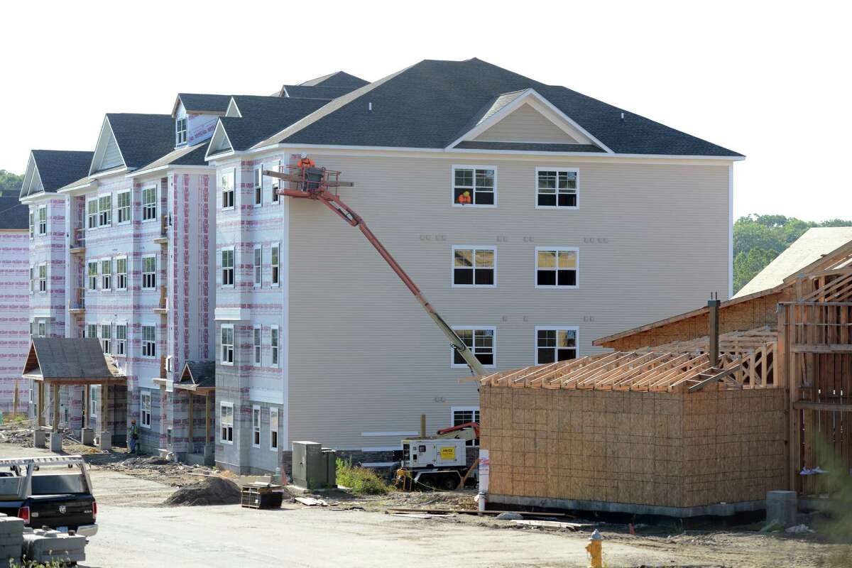 Shelton apartments rising next to Route 8