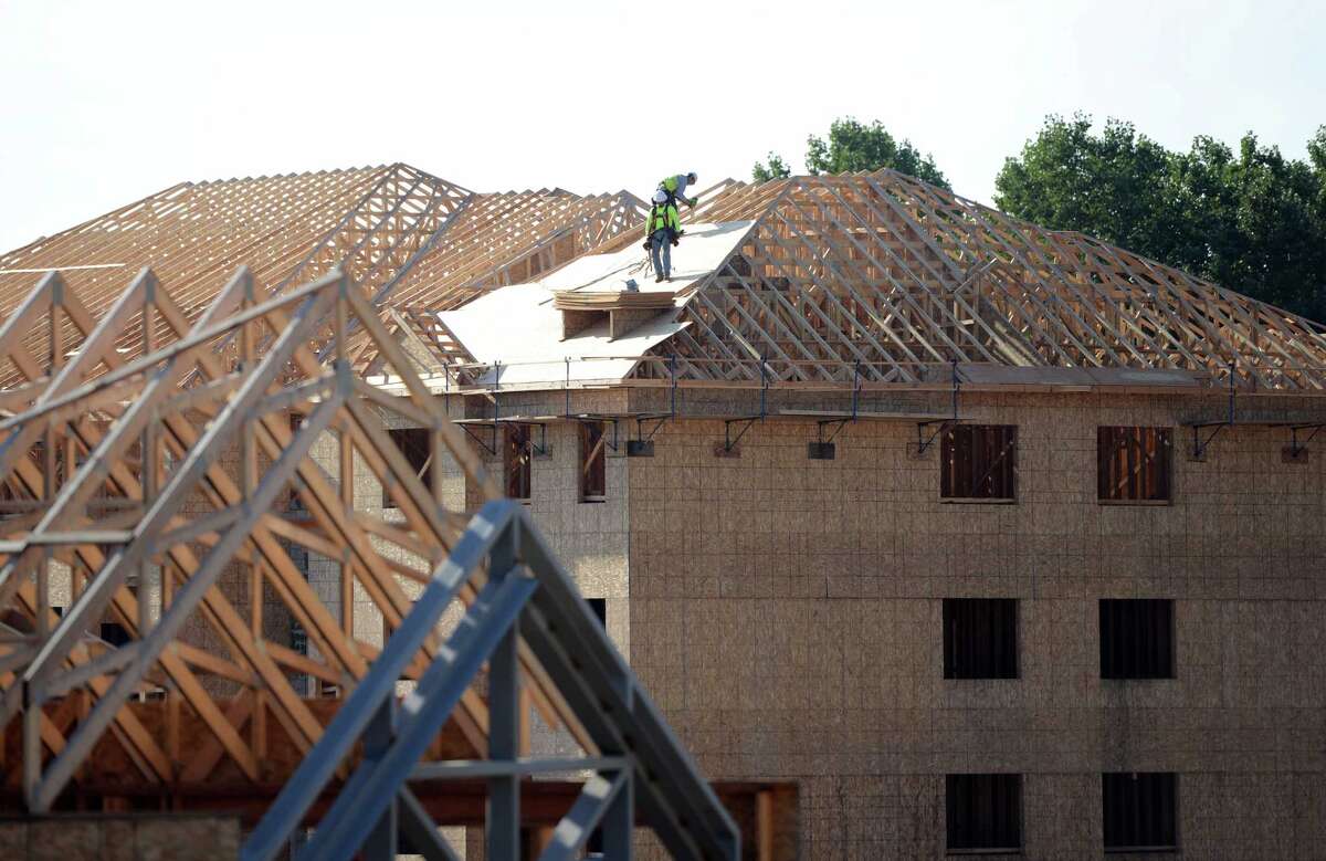 Shelton apartments rising next to Route 8