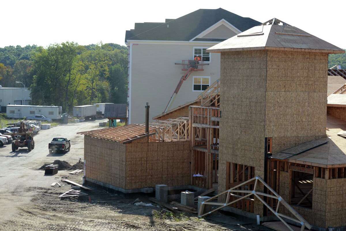 Shelton apartments rising next to Route 8