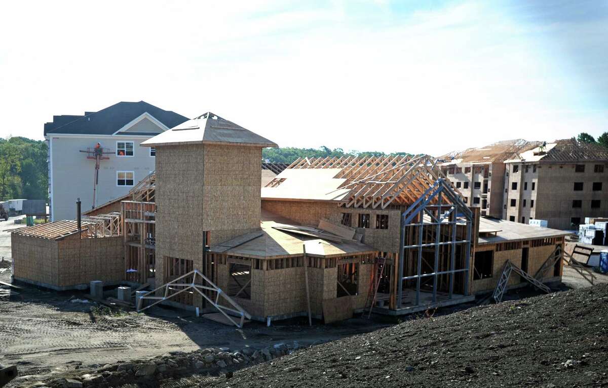 Shelton apartments rising next to Route 8