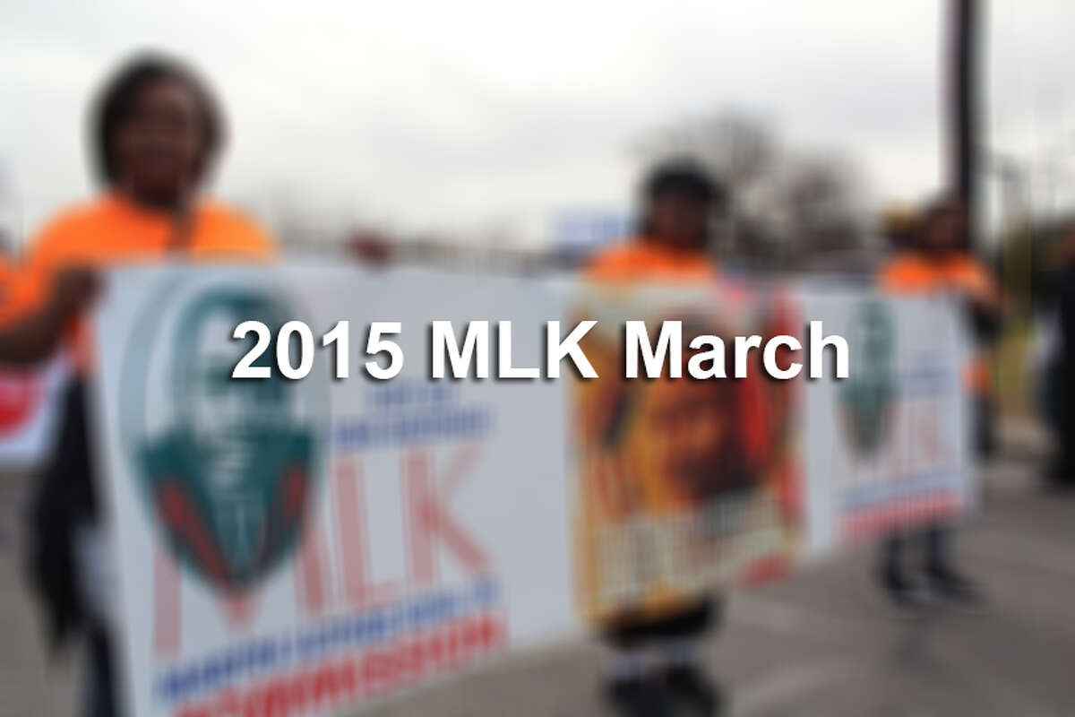 San Antonians participate in the city's Martin Luther King Jr. March on Monday, Jan. 19, 2015.