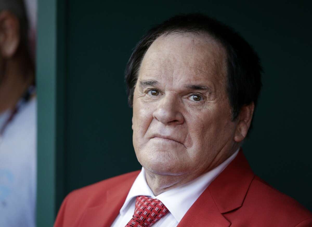 FILE - In this July 14, 2015, file photo, Pete Rose waits to be introduced before the MLB All-Star baseball game in Cincinnati. Pete Rose has made his case for reinstatement with Commissioner Rob Manfred, who promised a decision by the end of December. Major League Baseball said the meeting with the career hits leader and his representatives took place Thursday, Sept. 24, 2015, at baseball's headquarters in New York. "Commissioner Manfred informed Mr. Rose that he will make a decision on his application by the end of the calendar year," MLB said in a statement. (AP Photo/John Minchillo)