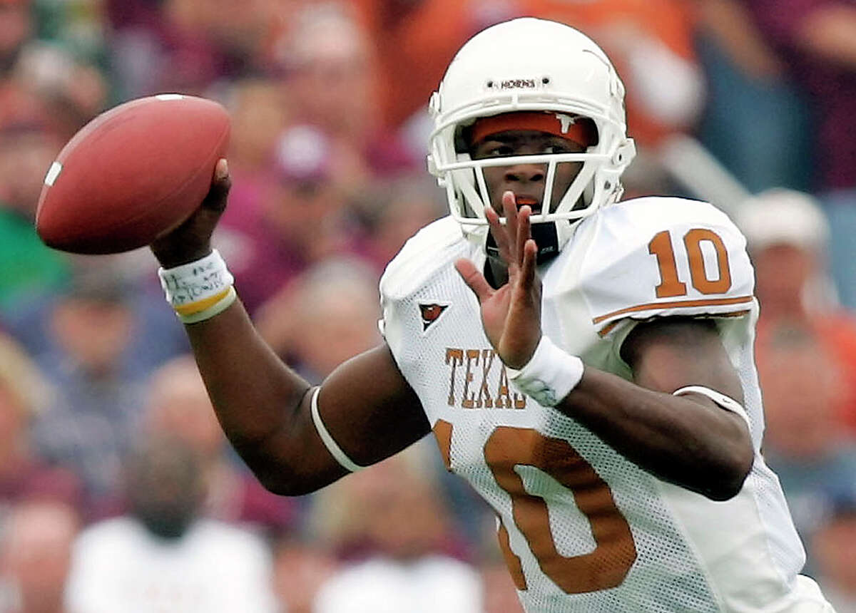 Texas quarterback Vince Young looks to throw a pass against Texas A&M during the first quarter in College Station on Nov. 25, 2005.