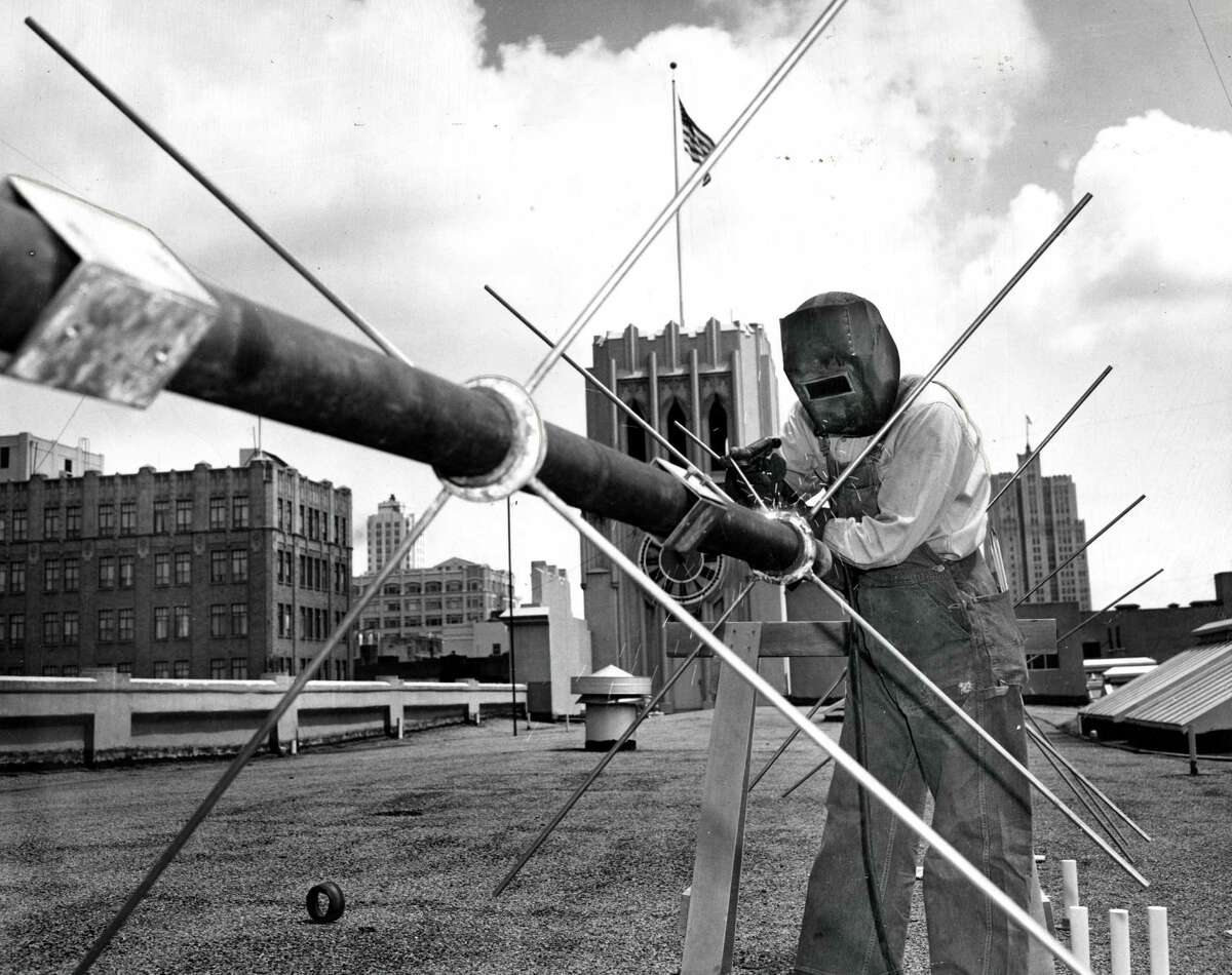 Antenna for radio station KRON being installed on top of the San Francisco Chronicle building Phot0 ran 6/16/1947