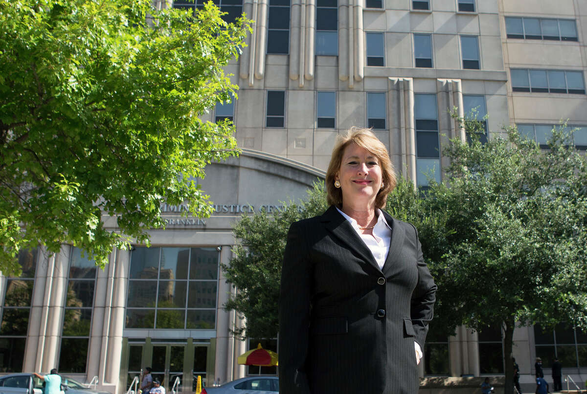 Former candidate for Harris County District Attorney Kim Ogg stands in front of the Harris County Criminal Courthouse after announcing her second run at office, Friday, Sept. 25, 2015, in Houston.