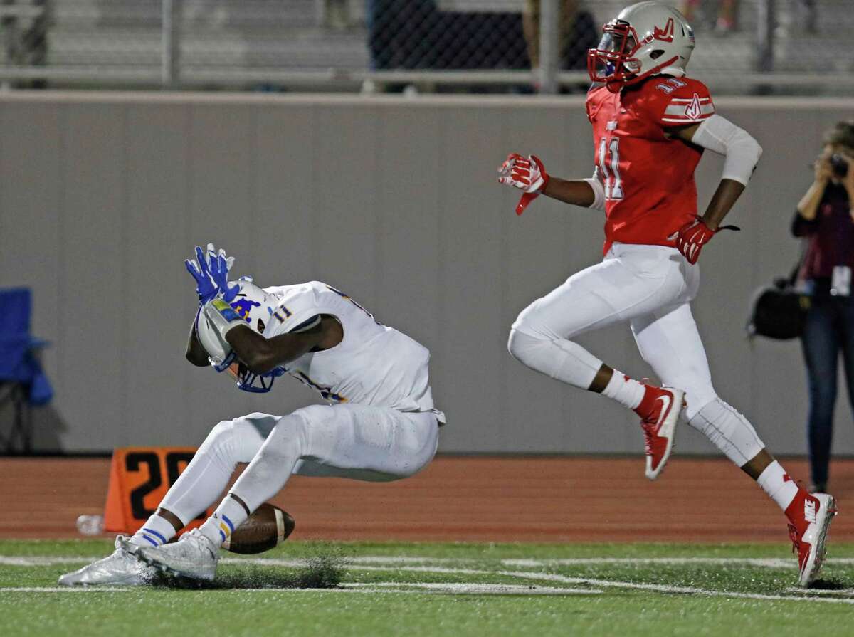 Clemens Tommy Bush reacts after dropping a wide open pass as Judson Malik Taylor follows the play in 2nd quarter. District 25-6A high school football game between Judson and Clemens at Rutledge Stadium on September 25, 2015.