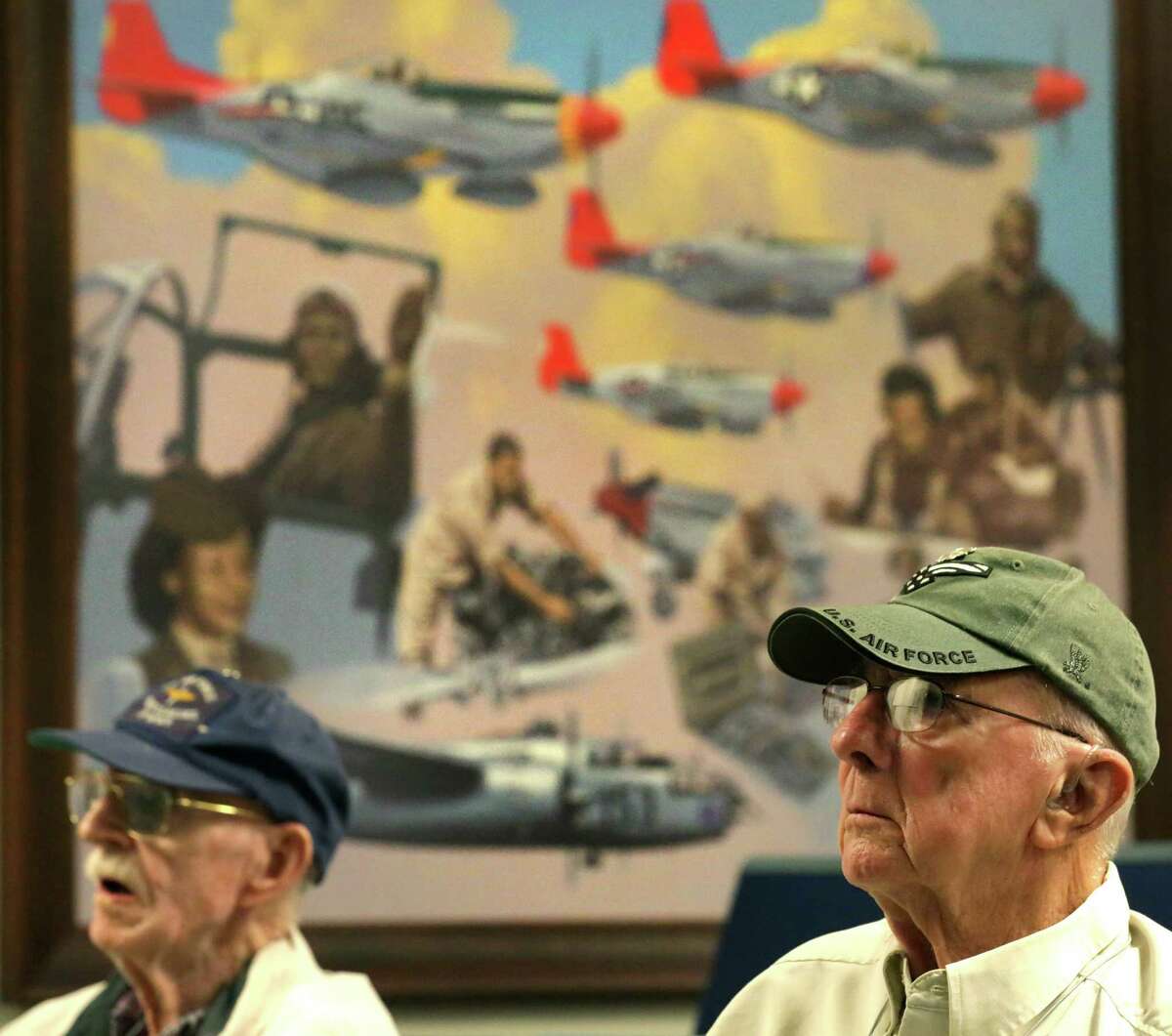 Frank Thornburg Jr., right, and other Army Air Corps veterans from the U.S. Air Force Pilot Classes of World War II, listen to an introduction of the 99th Flight Training Squadron with was home of the Tuskegee Airmen, as a group of WWII pilots tour Joint Base San Antonio-Randolph on Friday, Sept. 25, 2015.
