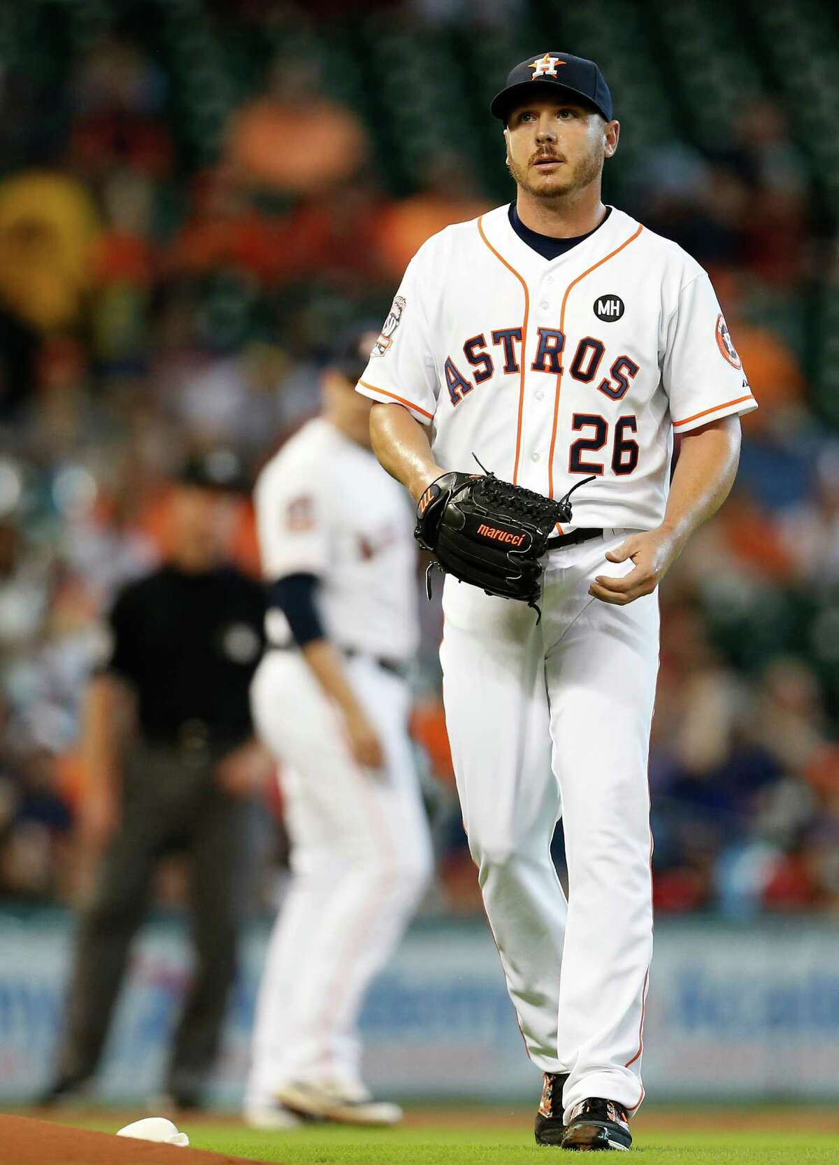 Houston Astros starting pitcher Scott Kazmir (26) between pitches during the first inning of an MLB baseball game at Minute Maid Park on Saturday, Sept. 19, 2015. ( Karen Warren / Houston Chronicle )