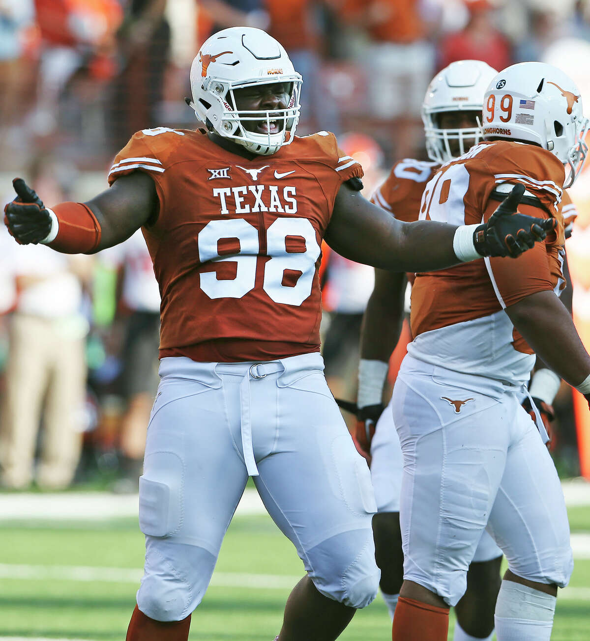 Longhorn defensive tackle Hassan Ridgeway celebrates a sack as Texas hosts Oklahoma State at DKR Stadium on September 26, 2015. Ridgeway is the only Longhorn who will attend the NFL Combine.