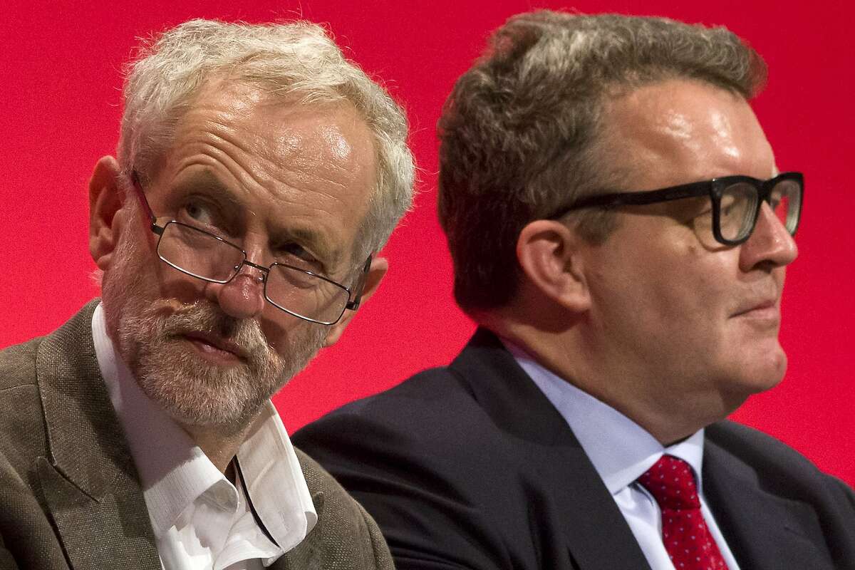 Britain's opposition Labour Party leader Jeremy Corbyn (L) and deputy leader Tom Watson (R) sit on stage during the annual Labour Party conference in Brighton, southern England, on September 27, 2015. AFP PHOTO / JUSTIN TALLISJUSTIN TALLIS/AFP/Getty Images