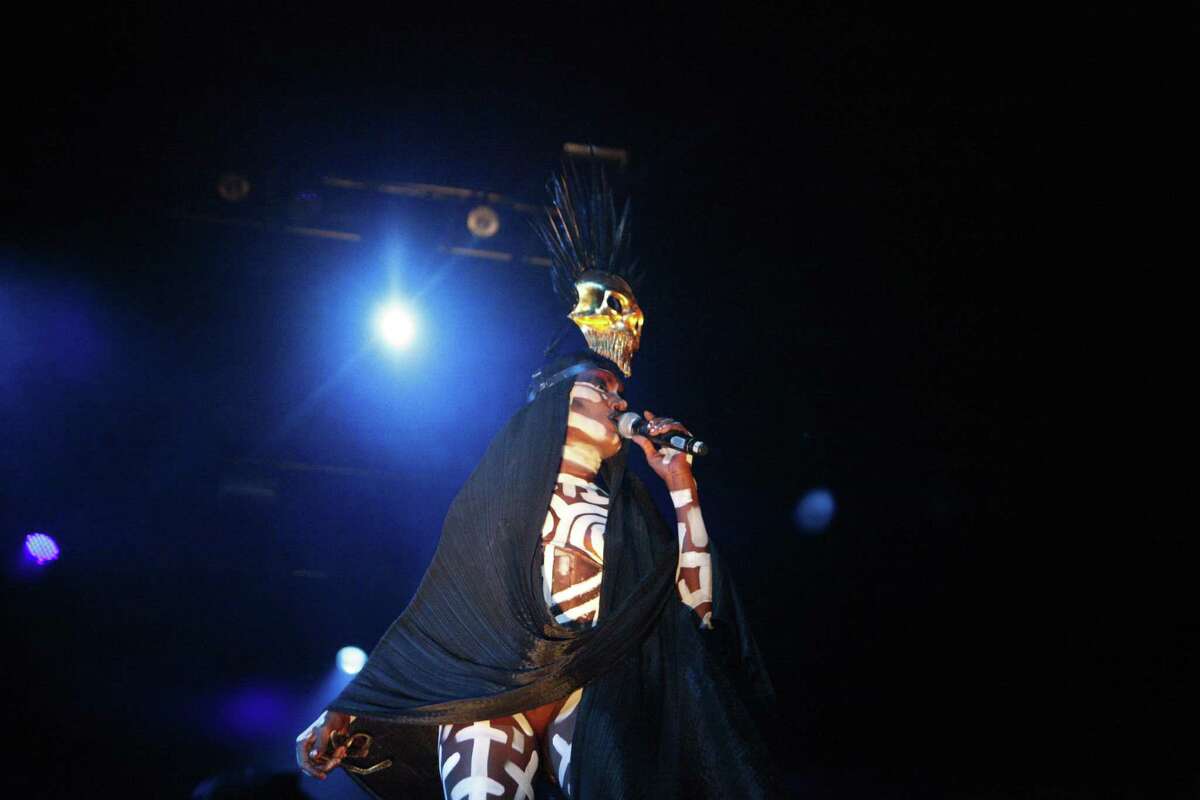 Grace Jones, above, rocks the Fox Theater in Oakland, left, as part of a tour to promote her memoir, “I’ll Never Write My Memoirs.” She also sang a piece from a promised new album inspired by African sounds, although the release date remains uncertain.