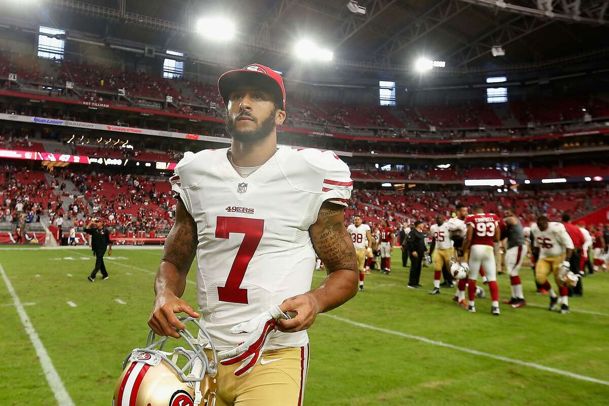 GLENDALE, AZ - SEPTEMBER 27: Quarterback Colin Kaepernick #7 of the San Francisco 49ers walks off the field after being defeated by the Arizona Cardinals 47-7 in the NFL game at the University of Phoenix Stadium on September 27, 2015 in Glendale, Arizona. (Photo by Christian Petersen/Getty Images)