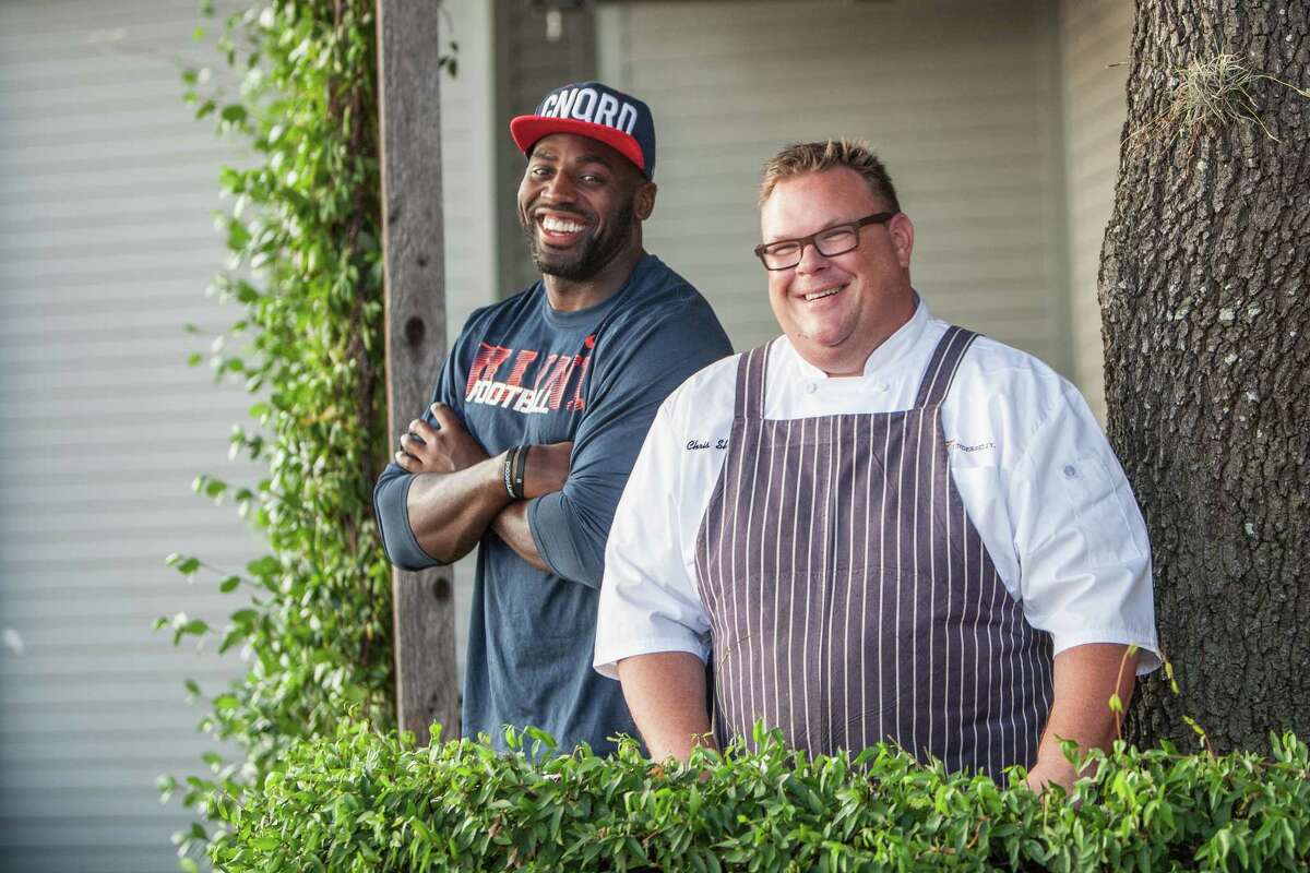 Chris Shepherd, right, chef/owner of Underbelly, prepares meals weekly for Texans outside linebacker Whitney Mercilus and other members of the team. The above photo is from 2015.