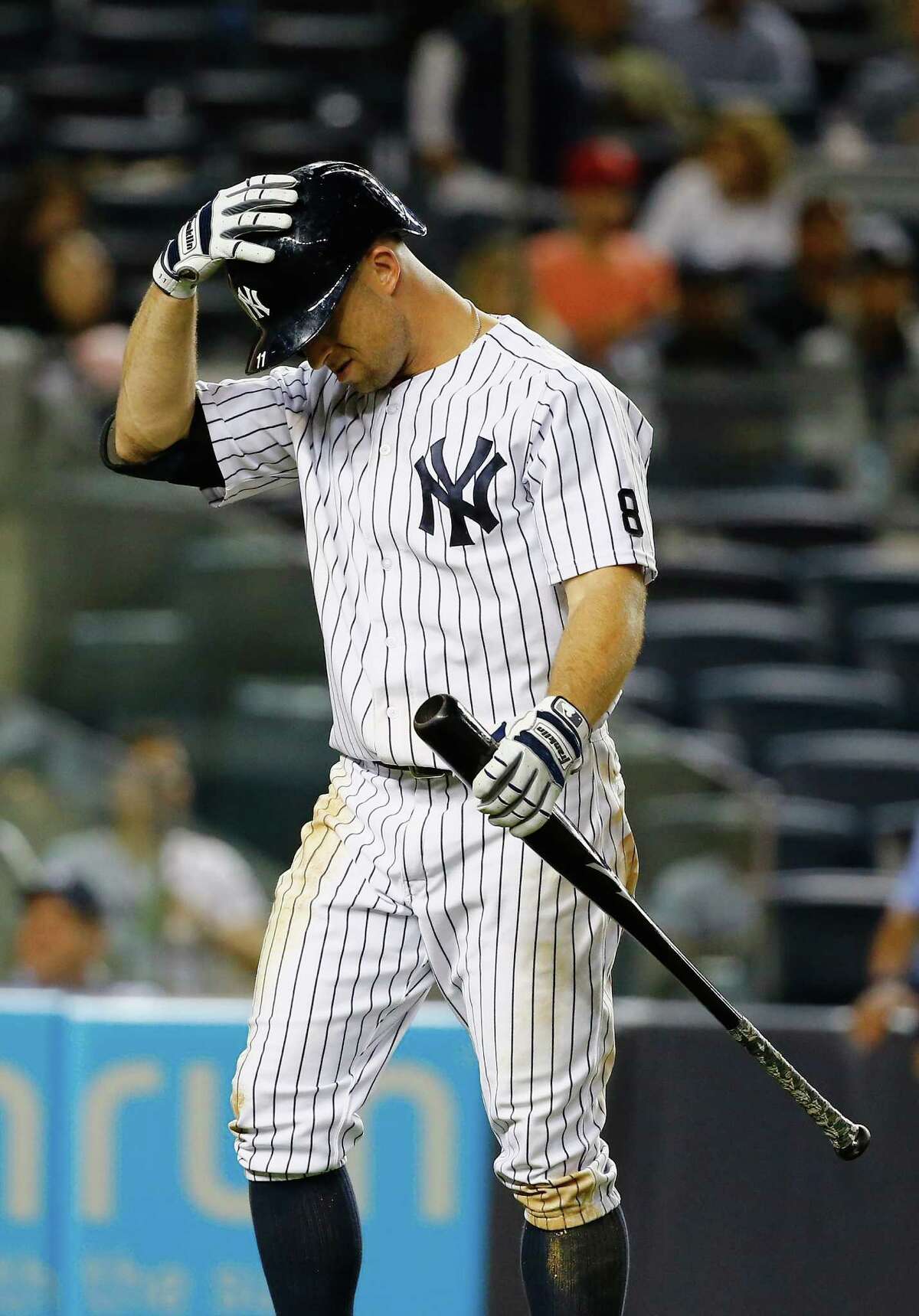 NEW YORK, NY - SEPTEMBER 28: Brett Gardner #11 of the New York Yankees looks on after striking out to end the game losing the Boston Red Sox 5-1 at Yankee Stadium on September 28, 2015 in New York City. (Photo by Al Bello/Getty Images) ORG XMIT: 538595797