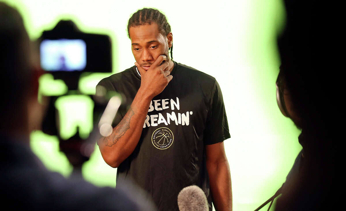 Spurs’ Kawhi Leonard is interviewed during media day Monday Sept. 28, 2015 at the Spurs practice facility.
