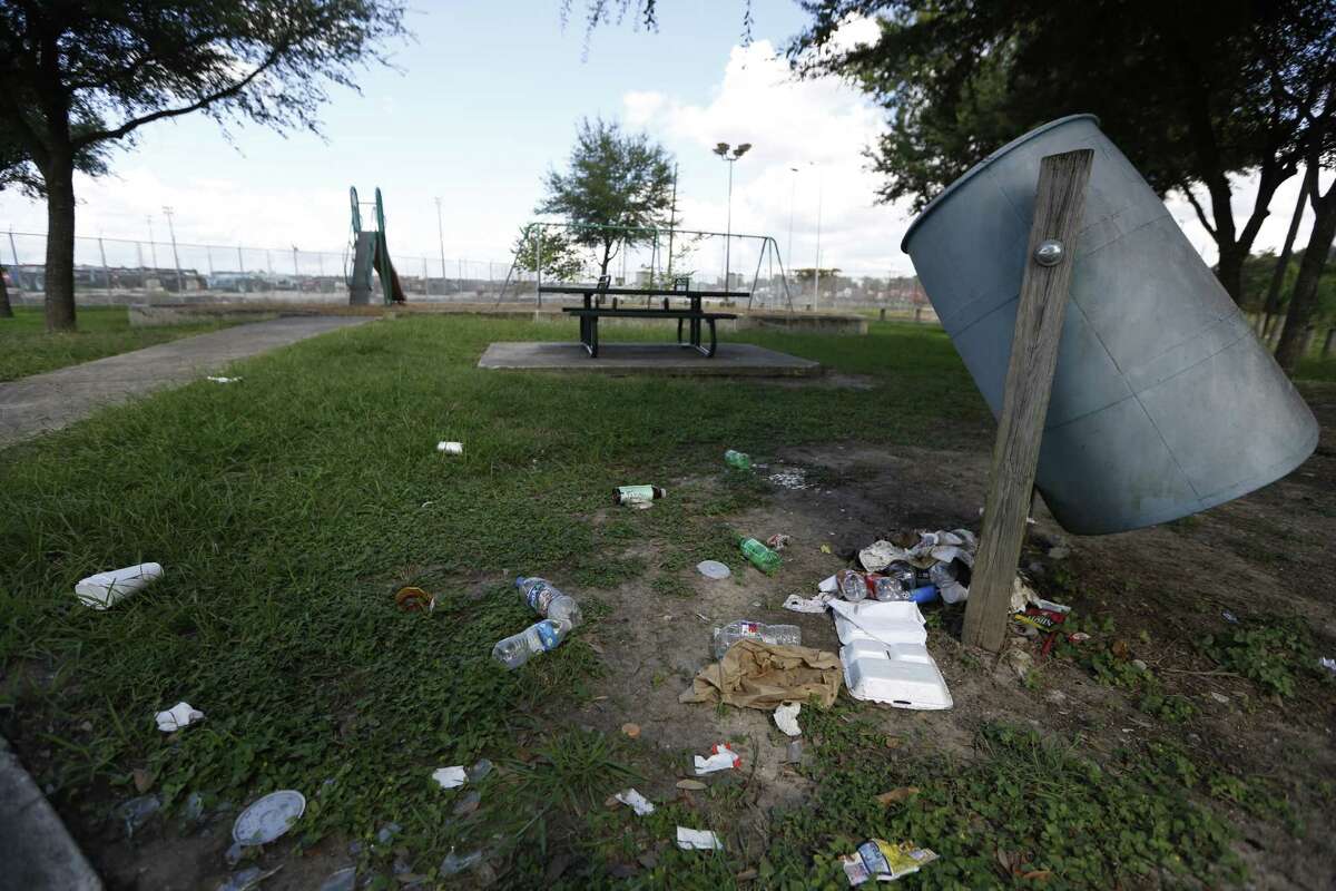 Broken glass and other trash litter the Barbara Jordan Family Park in northeast Houston. One resident, Cynthia Wilson, says she largely avoids the parks in her area out of fear.