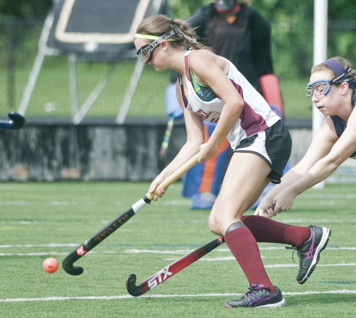 Bethel High School's Samantha Segiet moves the ball during the high school field hockey jamboree at Immaculate High School. Sunday, Aug. 30, 2015