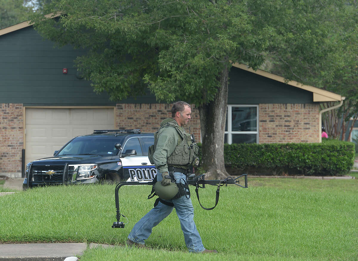 Woman safe after being held at knifepoint in domestic incident