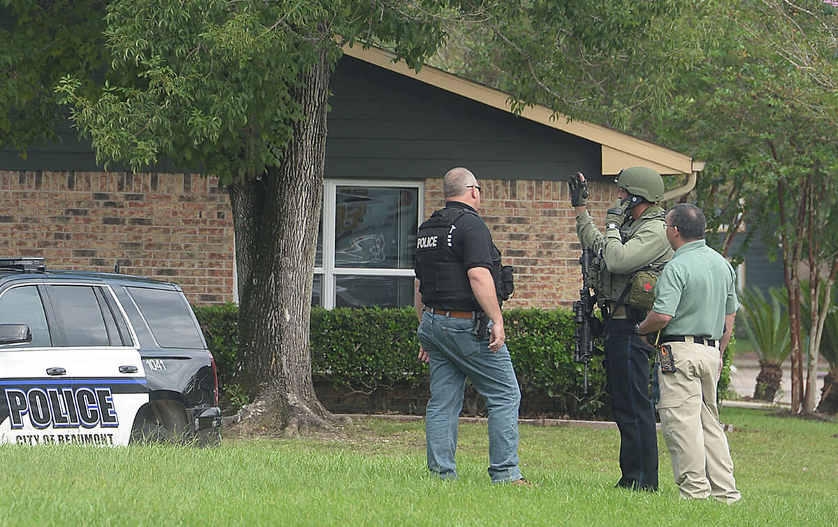 Woman safe after being held at knifepoint in domestic incident