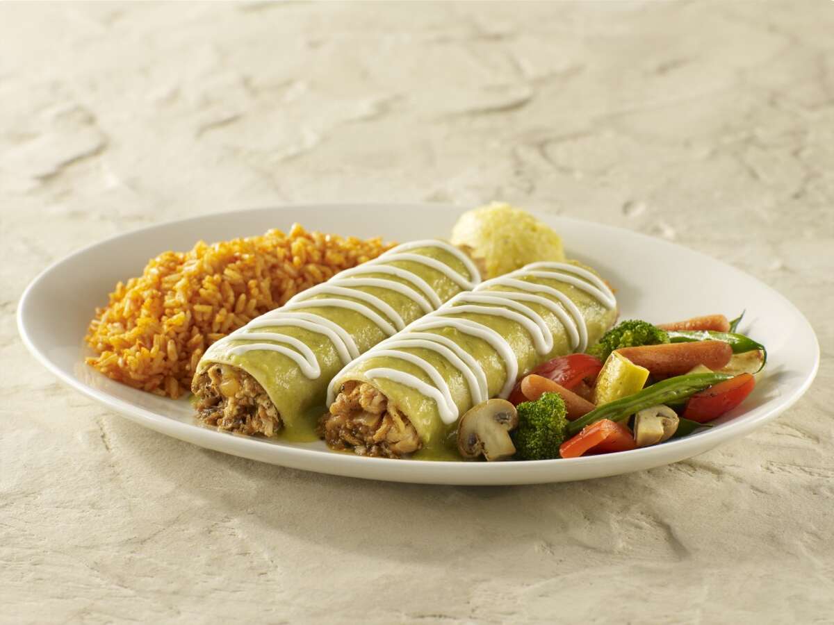 Tex-Mex vs. Mexican Food Traditional enchiladas are covered with green or red sauces and crema.