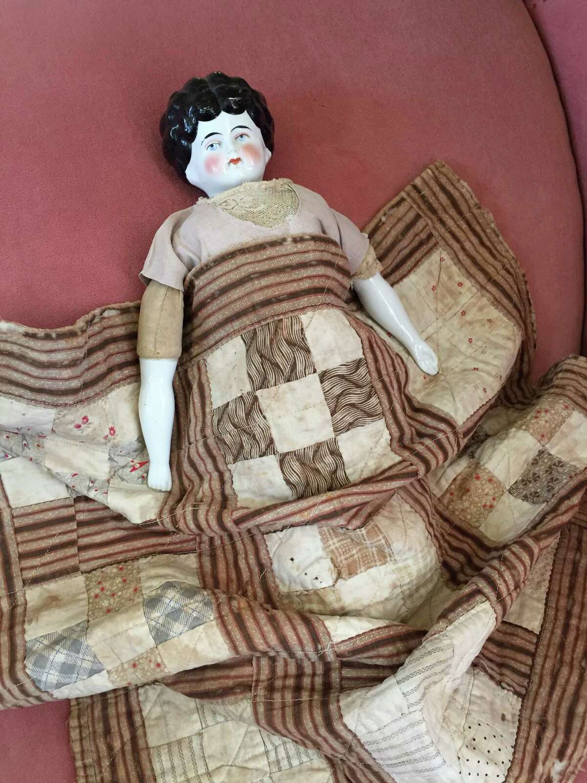 Here's a traditional "Block" doll quilt made by Martha Jane Veal for her daughter Mantie. Martha died at the Dew House in 1907. DeWalt Heritage Center's free exhibit called "Quilting Our Community Together" will be open Sunday afternoons on Oct. 4, 11, 18 and 25.