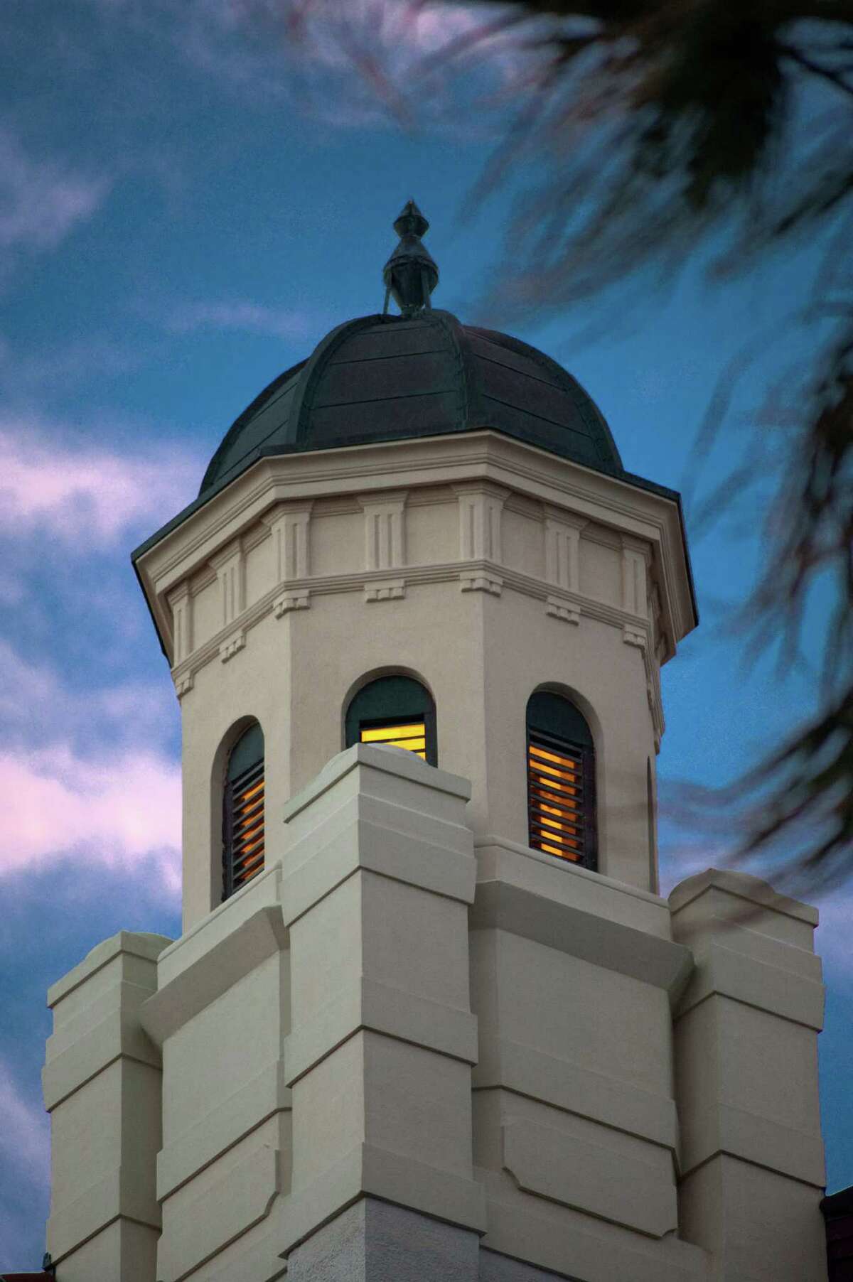 View of the haunted Southwest tower at the Hotel Galvez at dusk
