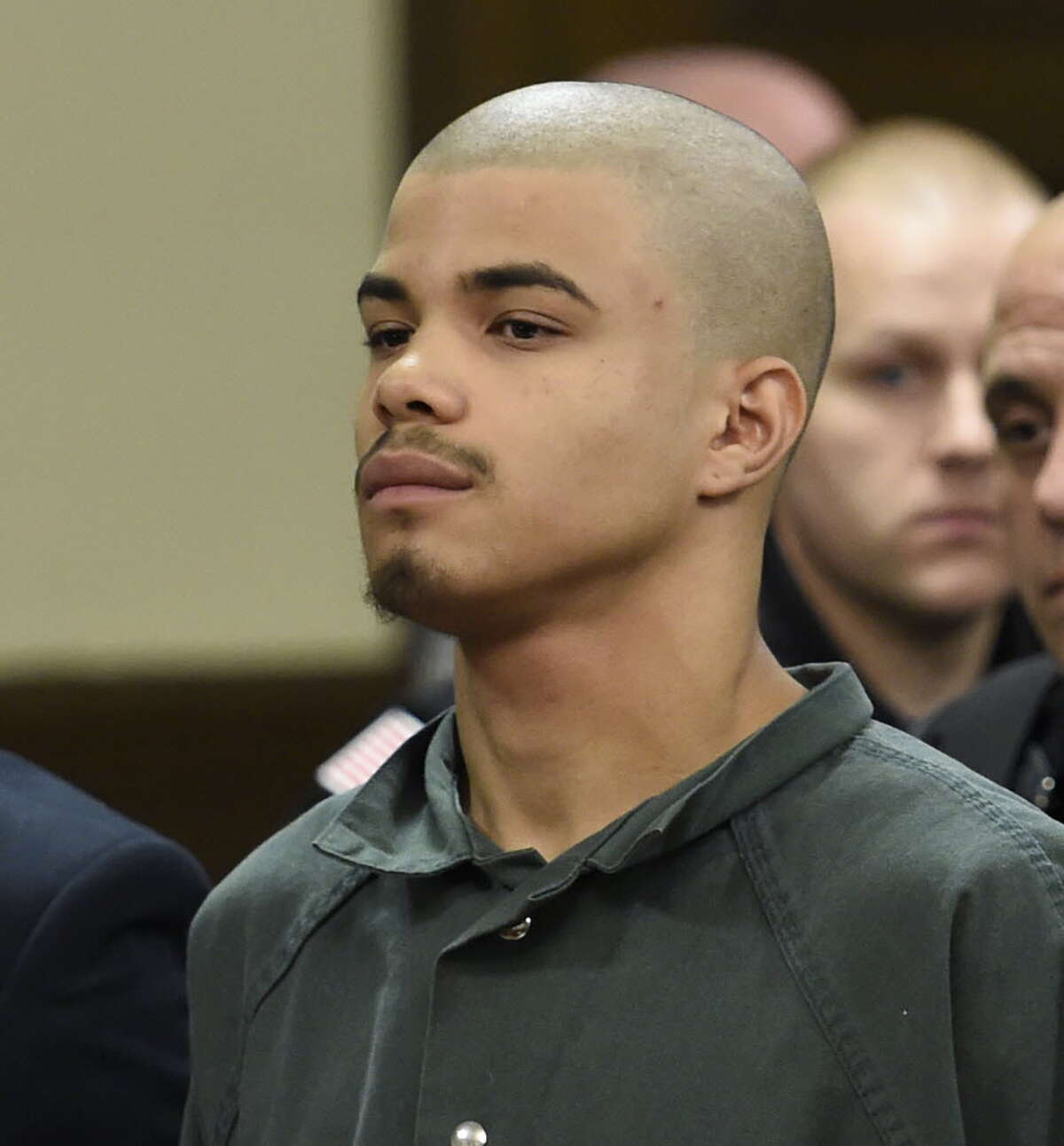 Gabriel Vega, center, was arraigned on numerous charges including murder in connection with the Vanessa Milligan murder case in Rensselaer County Court on Thursday morning October 23, 2014 in Troy.  (Times Union file)