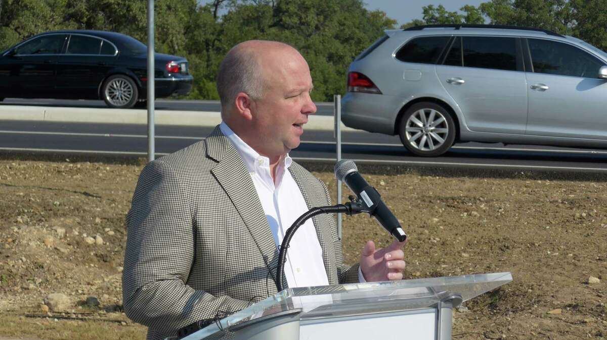 Precinct 3 Bexar County Commissioner Kevin Wolff marks completion of the county's $10 million road and drainage project on Boerne Stage Road, at a ribbon cutting event on Thursday Oct. 1 at the H-E-B at Interstate 10 West. The work widened the roadway and raised it out of flood danger.