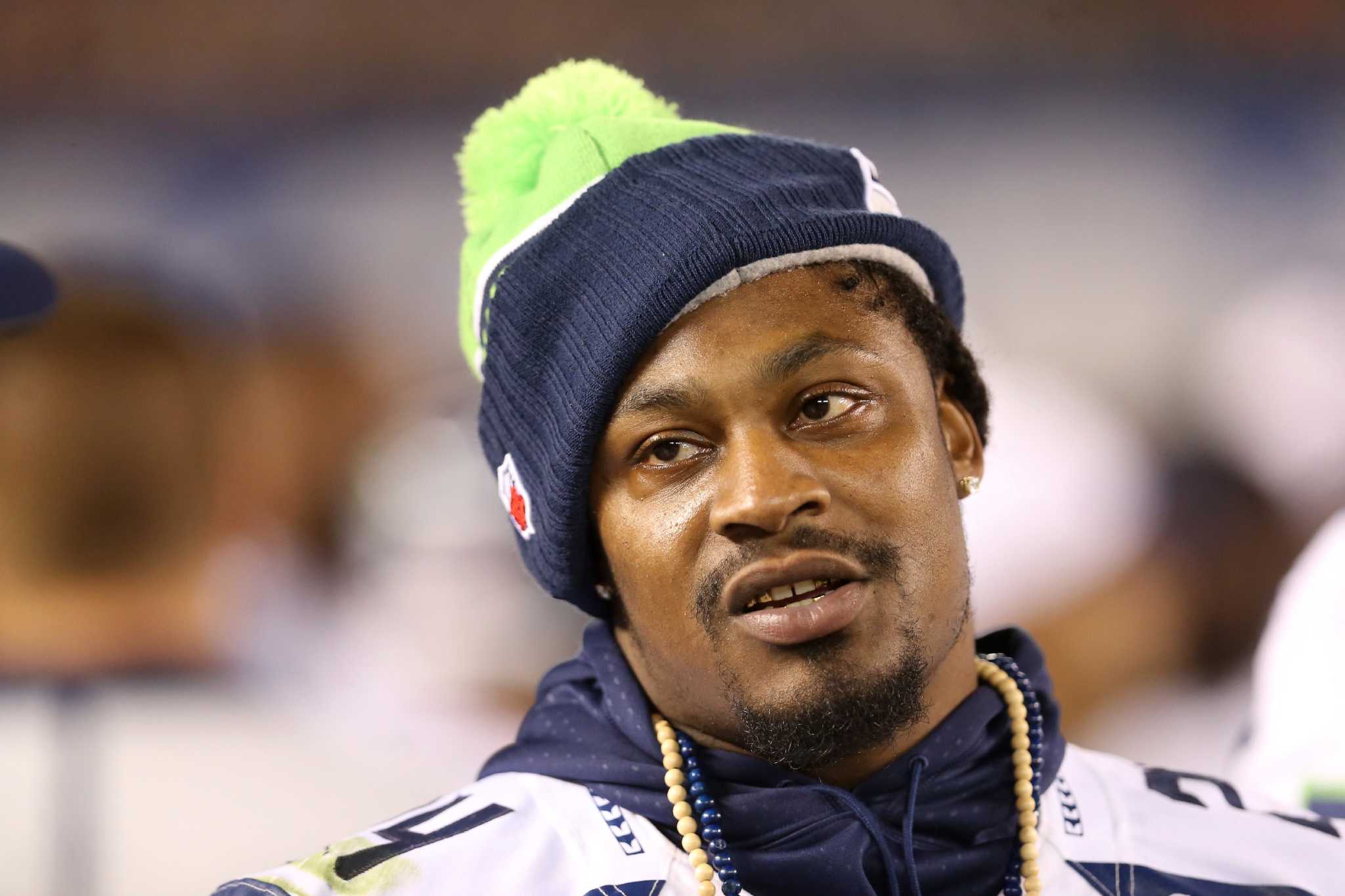 Von Miller, Josh Norman, and Marshawn Lynch wore fur hats and