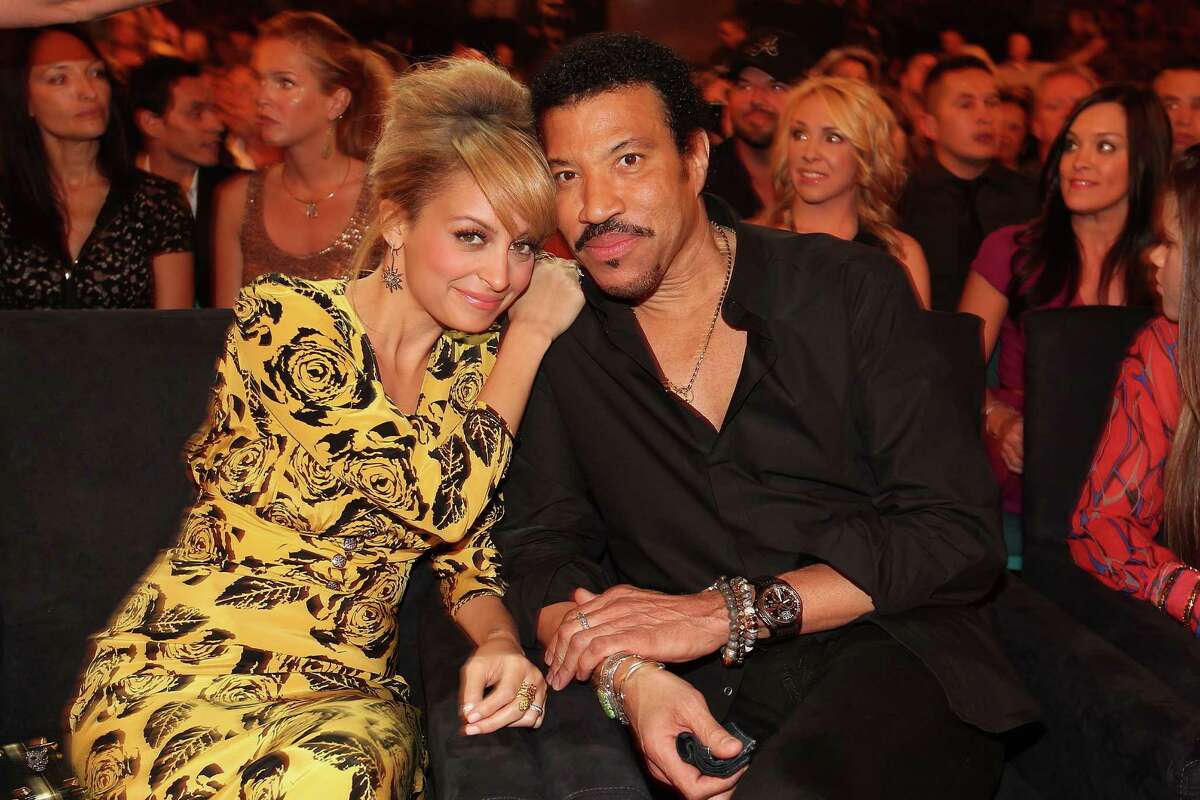 Lionel Richie and his wife adopted daughter Nicole Richie.