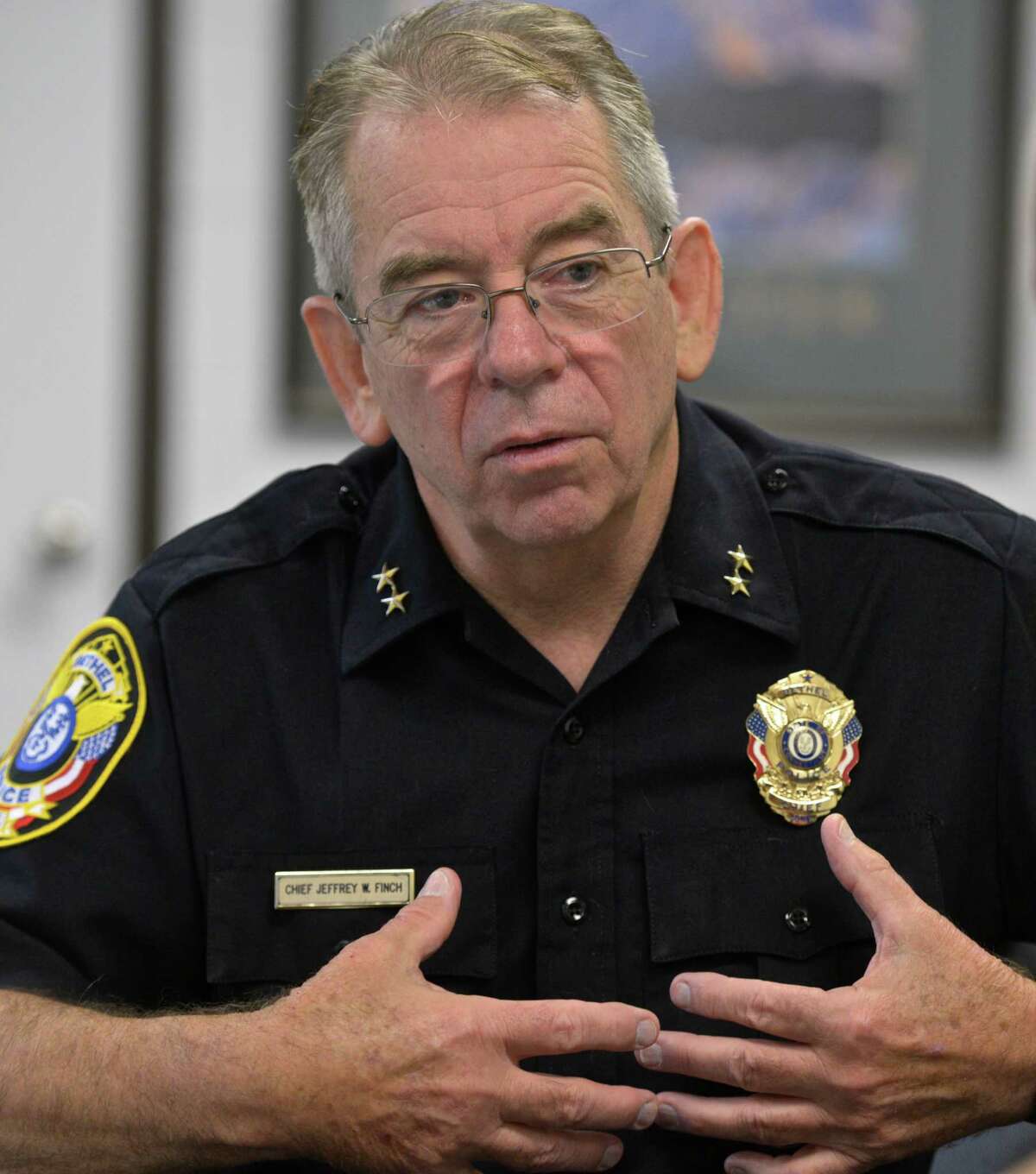Bethel Police Chief Jeffrey Finch talks about the FBI's latest crime report on Thursday, October 1, 2015, in Bethel, Conn.