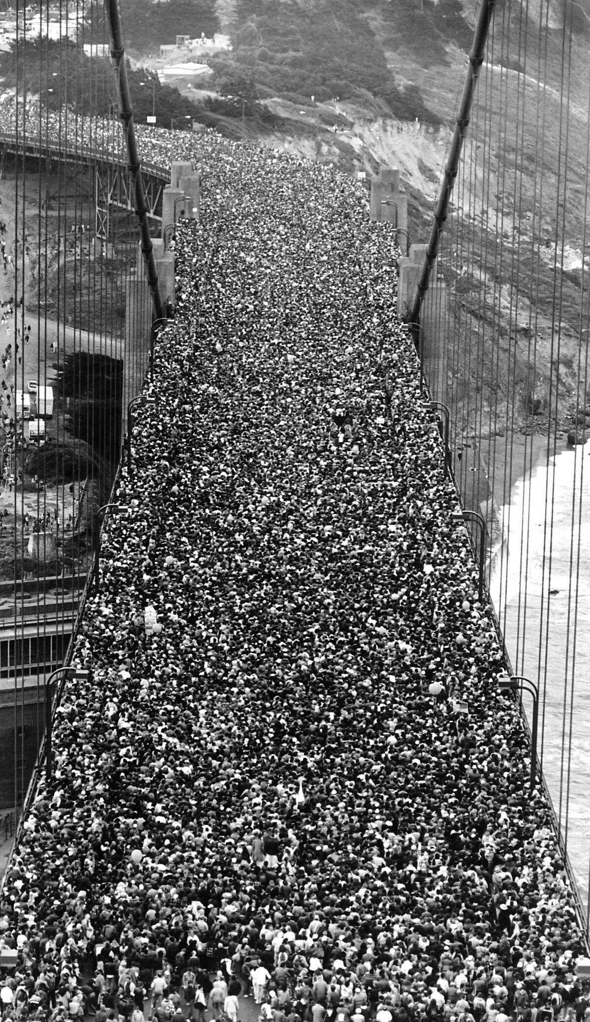 May 24, 1987 - Shot from the South Tower facing south down onto the roadway overlooking a mass of people at the 50th anniversary celebration for the Golden Gate Bridge.