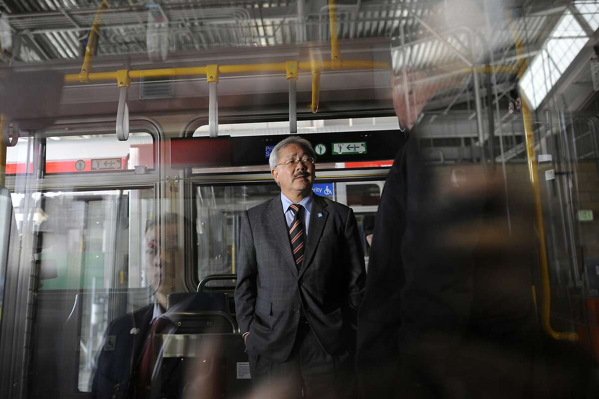 Mayor Ed Lee gets a look at the interior of a new MUNI bus during a press conference announcing MUNI service improvements, in San Francisco, CA Monday, September 28, 2015.