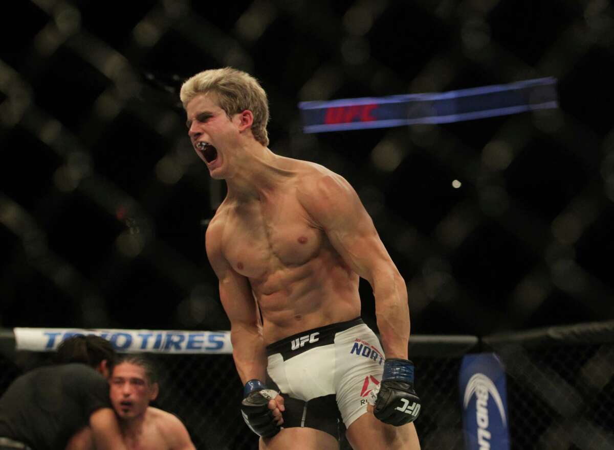 Katy's Sage Northcutt screams after defeating Francisco Trevino during UFC 192 at the Toyota Center Saturday, Oct. 3, 2015, in Houston. Northcutt won the match with a TKO in 57 seconds.