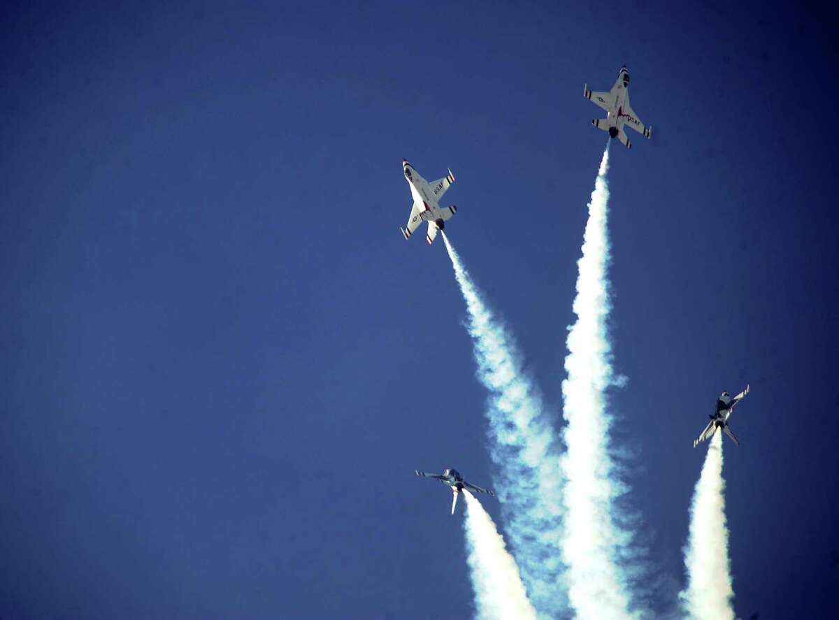 The Thunderbirds perform their signature bomb-burst maneuver during AirFest 2010 at Lackland Air Force Base on Saturday, Nov. 6, 2010. BILLY CALZADA / gcalzada@express-news.net