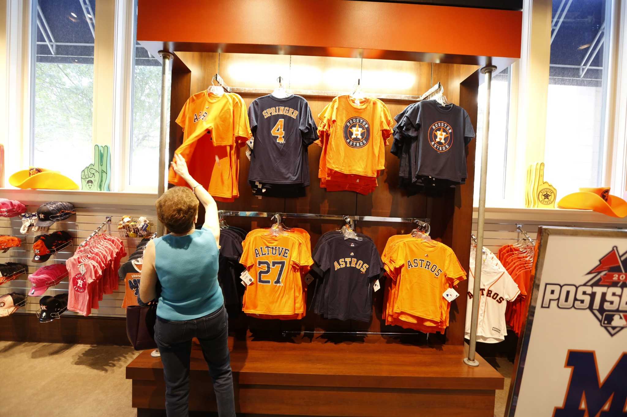 Astros fans snatch up playoff gear; postseason tickets on sale at