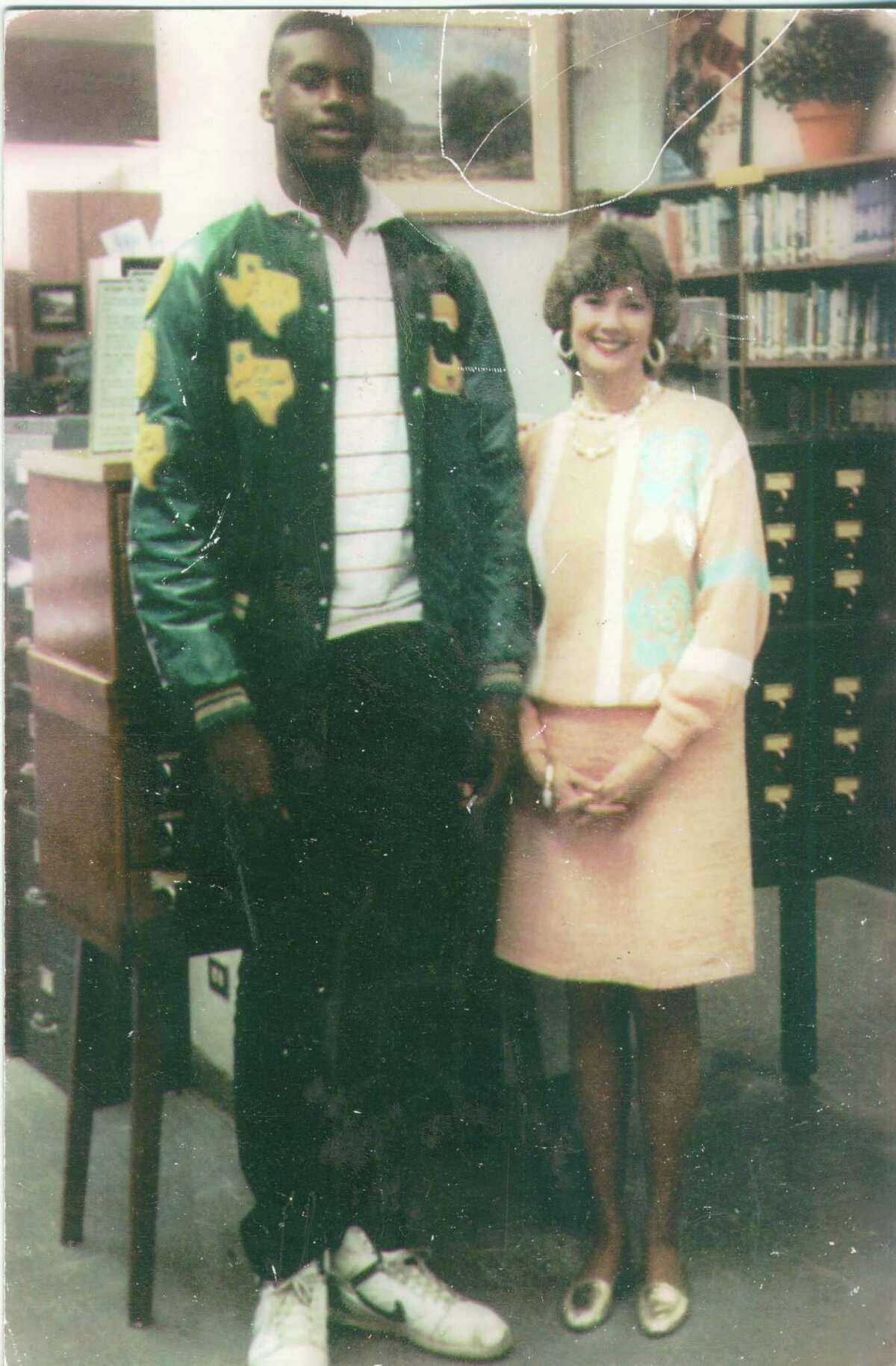 In 1989, shortly after the Cole High School boys basketball team posted a 36-0 record and won the 3A state championship, Shaquille ONeal posed with librarian Sandee Mewhinney.” I knew Shaquille would go far in his basketball career,” she writes, “so I wanted a picture with him.”