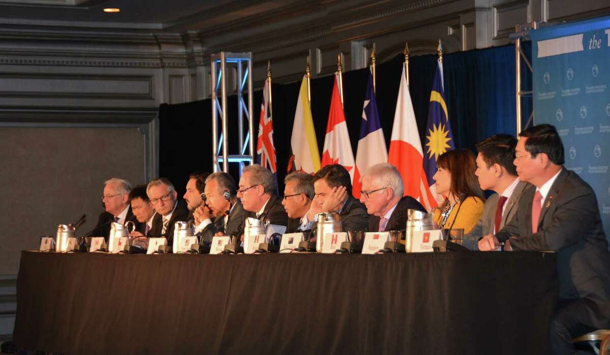 Trade ministers of the United States and 11 other Pacific Rim countries attend a press conference after negotiating the Trans-Pacific Partnership (TPP) trade agreement in Atlanta on Oct. 5.
